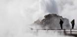 Winter visitors experience the magic of erupting geysers.