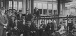 Immigrants awaiting inspection in front of Ellis Island's Main Building